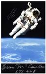Bruce McCandless Signed 14 x 19.25 Photo of Him Performing the First Non-Tethered Spacewalk -- Reach for the Stars!